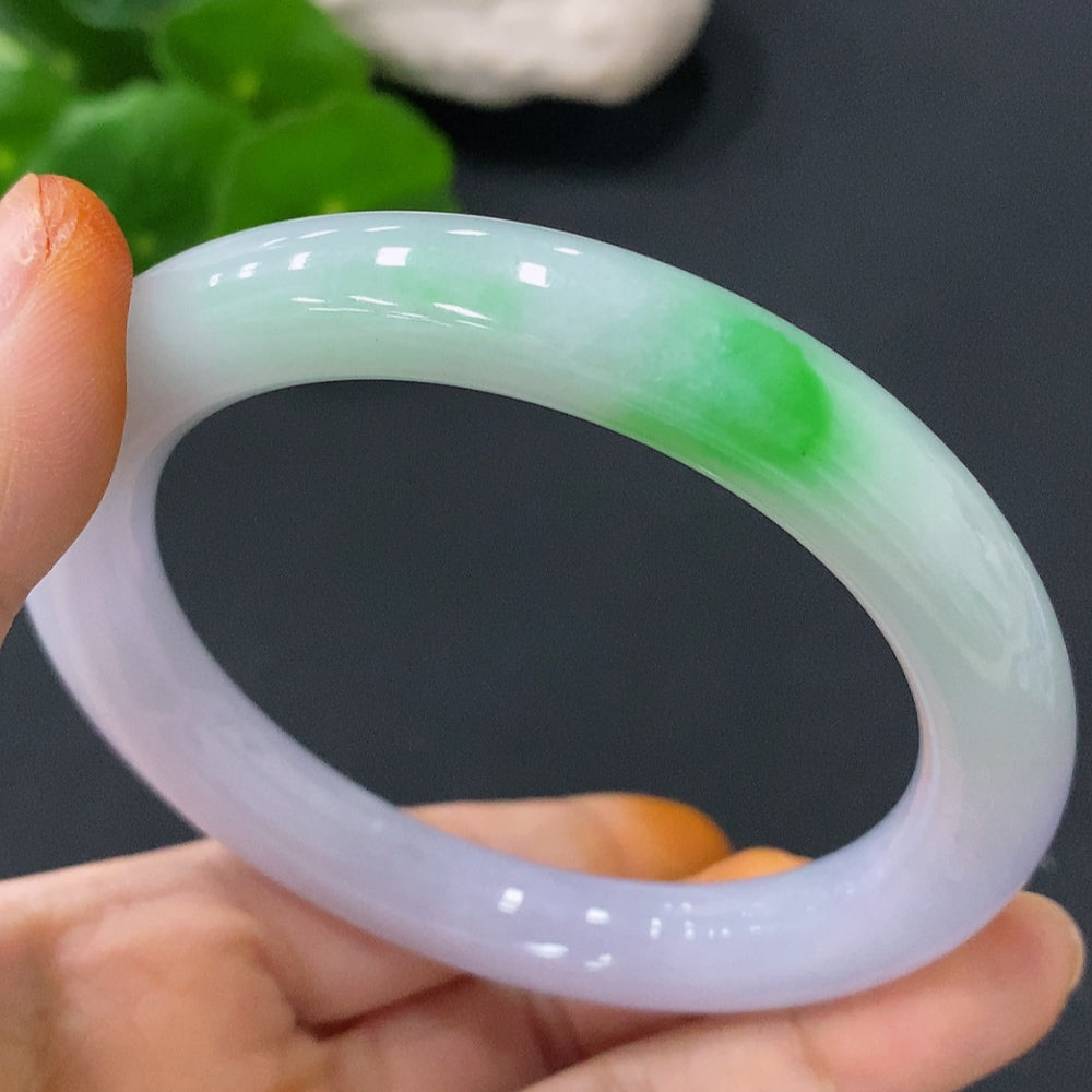 Huiliu Certified Jadeite Round Bangle in natural green jade, approximately 55mm diameter, showcasing smooth, polished surface.