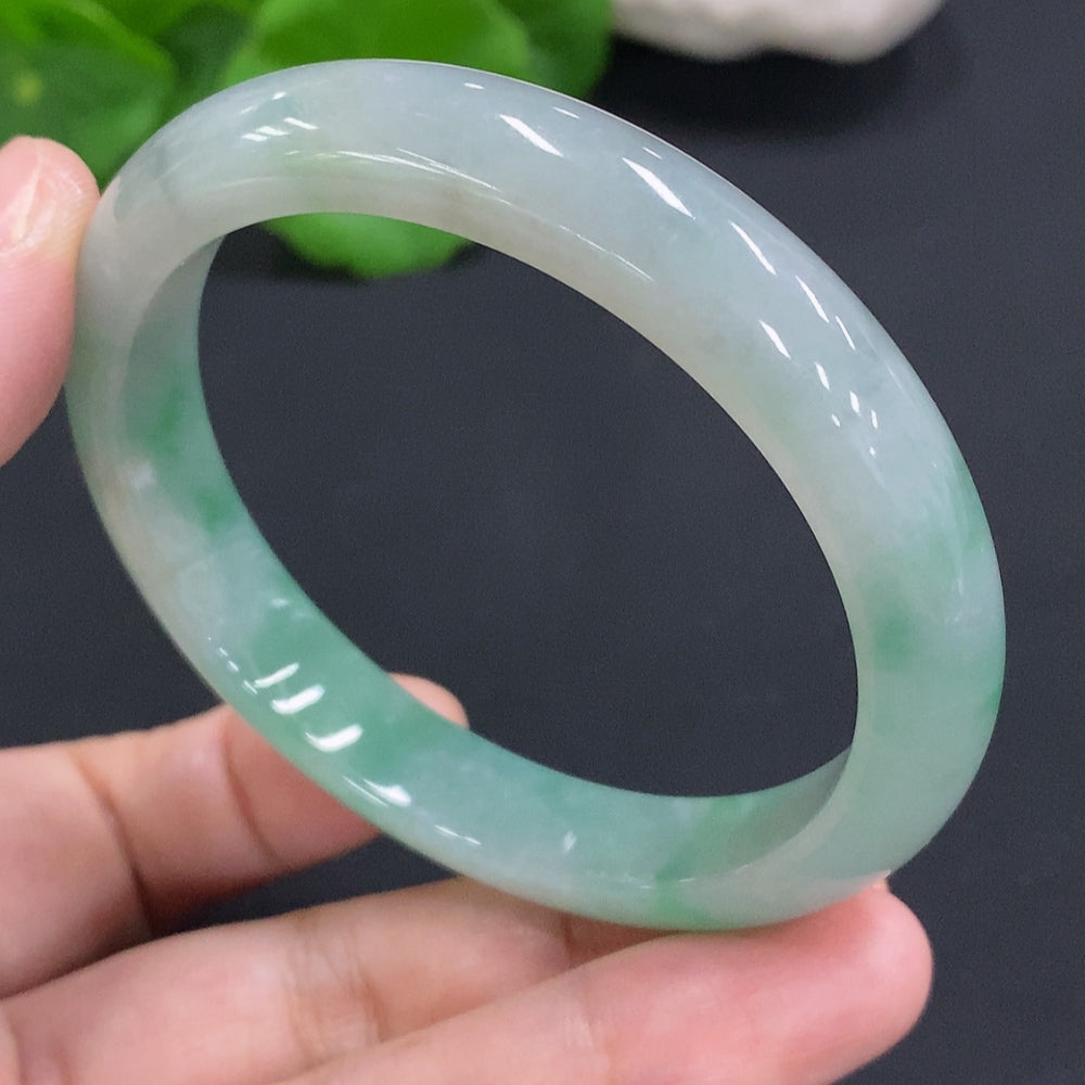HUILIU HQ jadeite round bangle, size 55.6, approximately 42.3g, showcasing smooth, polished jadeite with a glossy finish.