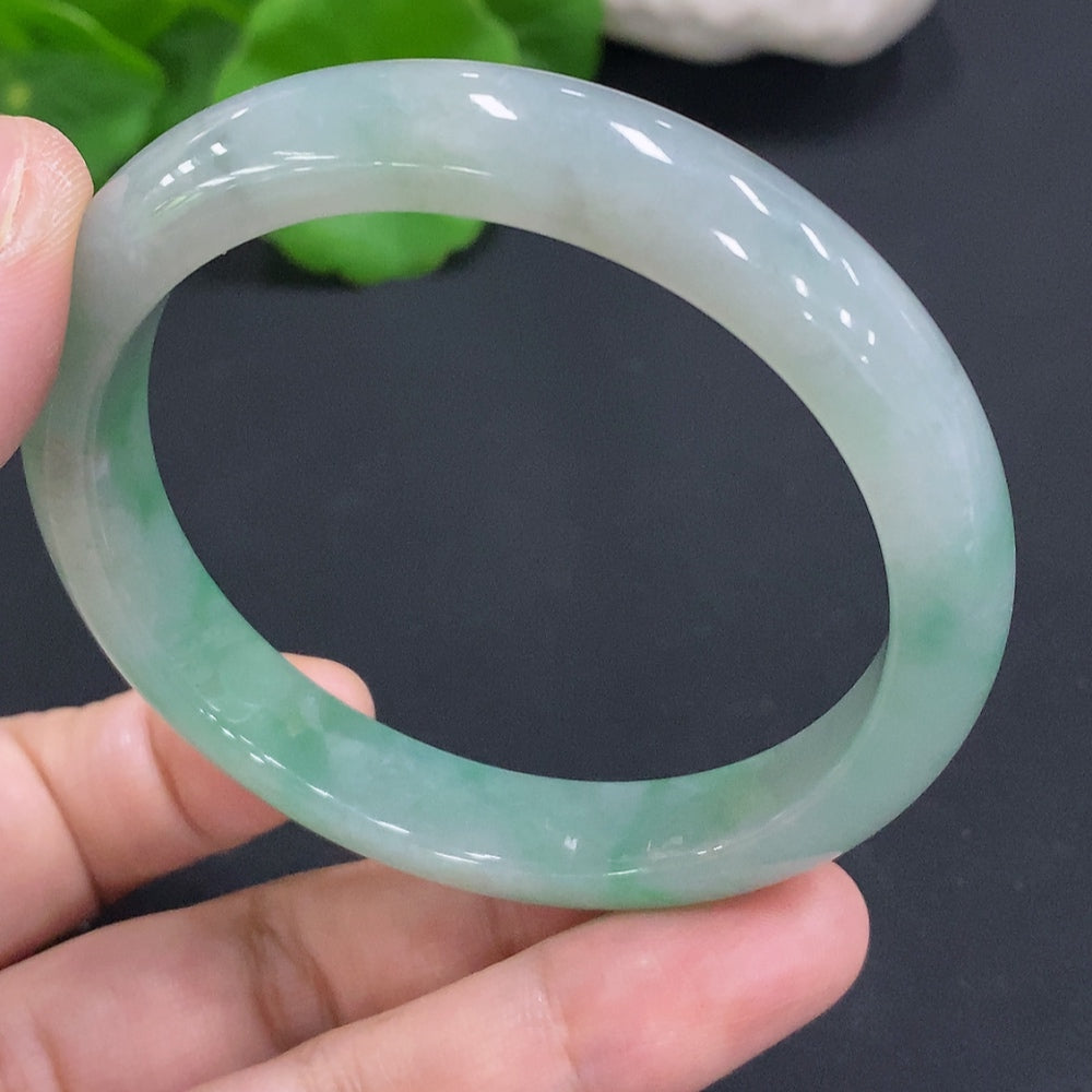 HUILIU HQ Jadeite round bangle, size 55.6, crafted from jade, weighs approximately 42.3g, showcasing smooth, polished surface.