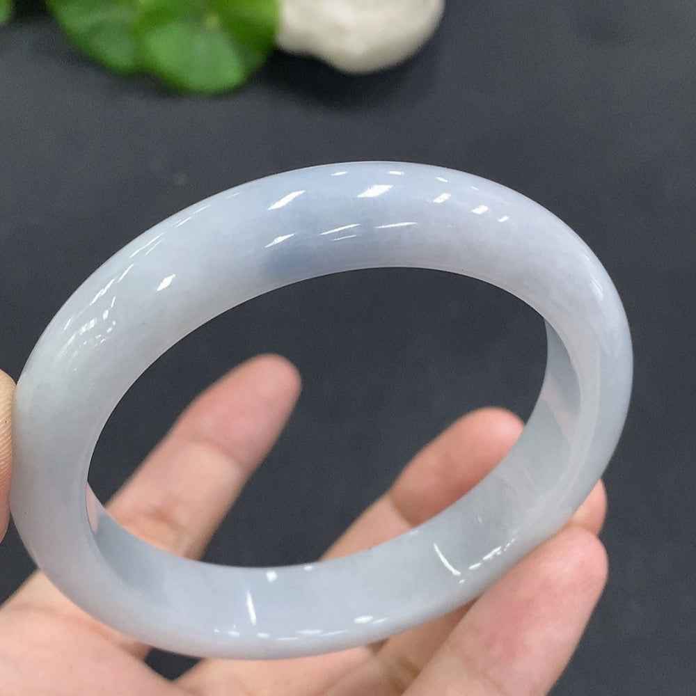 HUILIU HQ Jadeite round bangle in size 56, weighing 52.823g, featuring smooth, polished jadeite surface and circular shape.