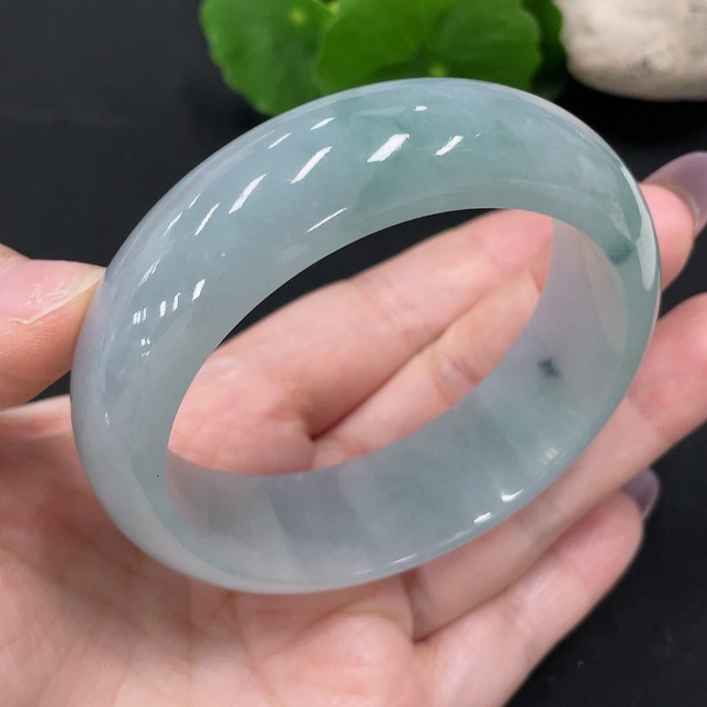 HUILIU HQ jadeite round bangle, size 57, weighing approximately 80.8g, featuring smooth, polished jade surface.