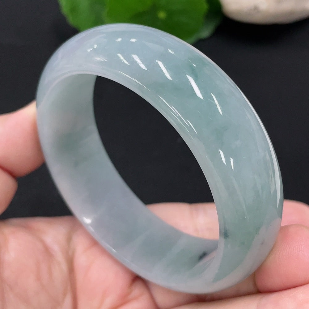 HUILIU HQ jadeite round bangle size 57, smooth jade jewelry with approximate weight 80.8g, showcasing polished green jade surface.