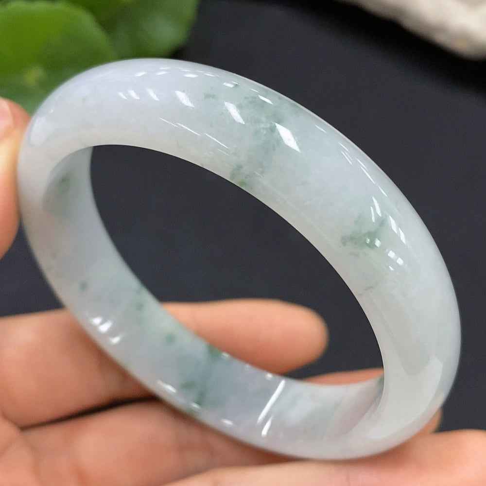 Huiliu Certified Jadeite round bracelet featuring smooth, polished green jade beads on a delicate string.