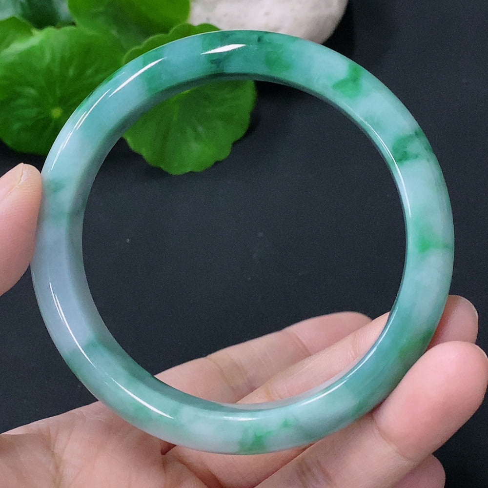 Huiliu Certified Jadeite round bracelet featuring smooth, polished green jade stones on a delicate elastic band.