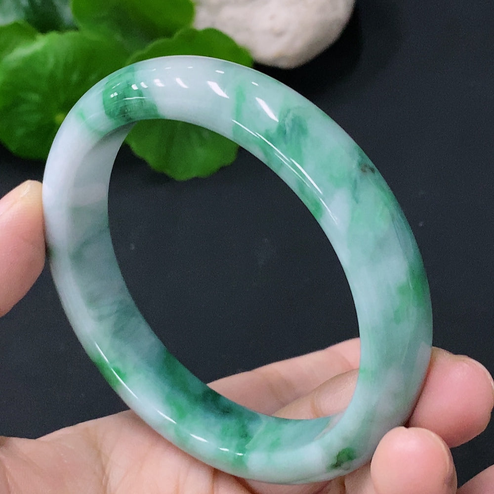 Huiliu HQ Jadeite round bracelet featuring smooth, polished green jade beads with Huiliu certification.