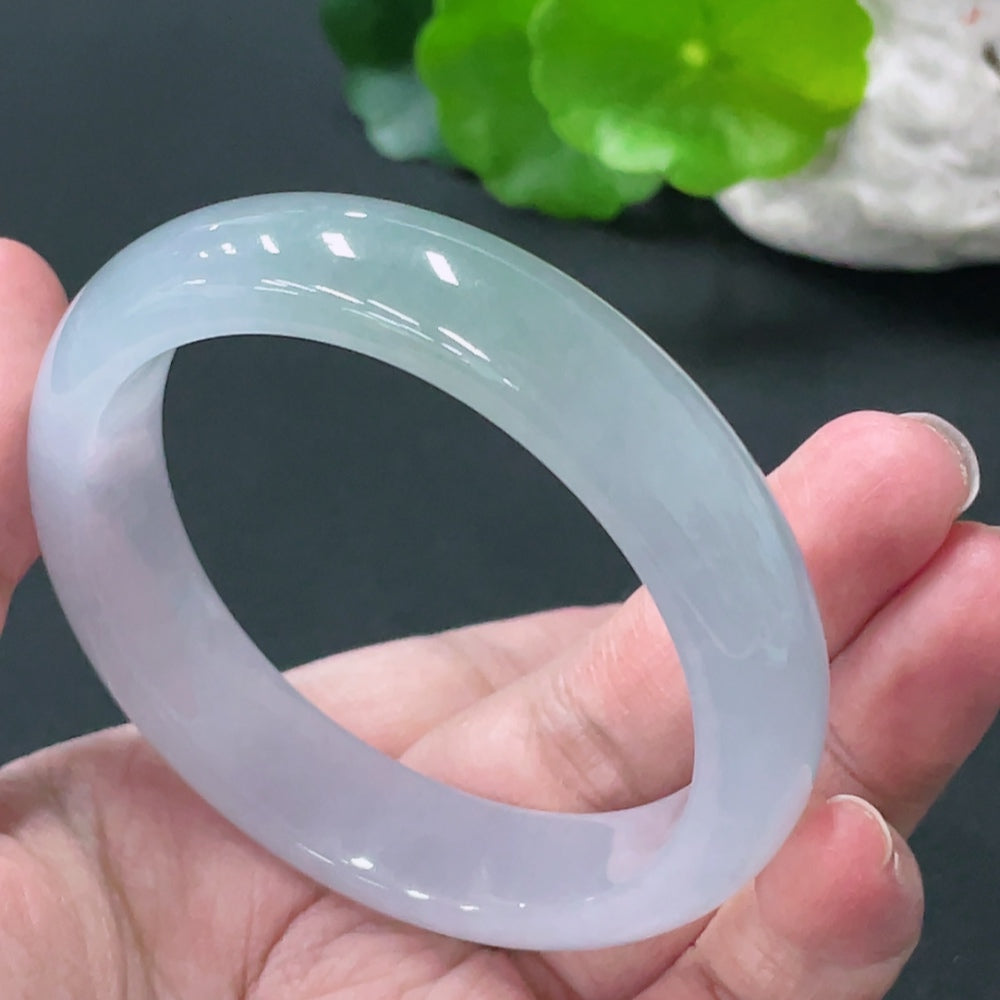HUILIU HQ jadeite round bracelet weighing 52.6g, size 53.6, featuring smooth polished jade stones on a flexible band.