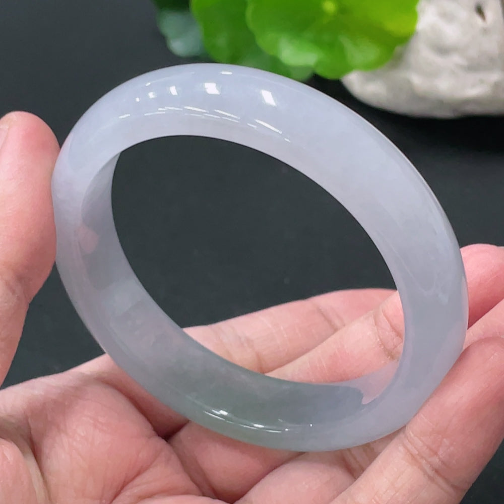 HUILIU HQ jadeite round bracelet weighing 52.6g with a size of 53.6, featuring polished jade stones in a smooth circular design.