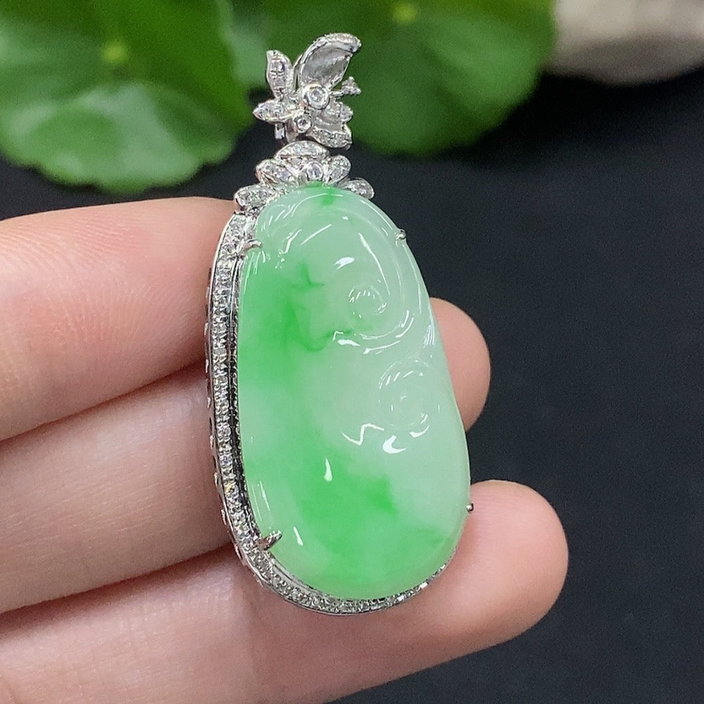 Jadeite Ruyi pendant in 18K gold with diamond accents, featuring intricate inlay design, weighs approximately 6.57 grams.