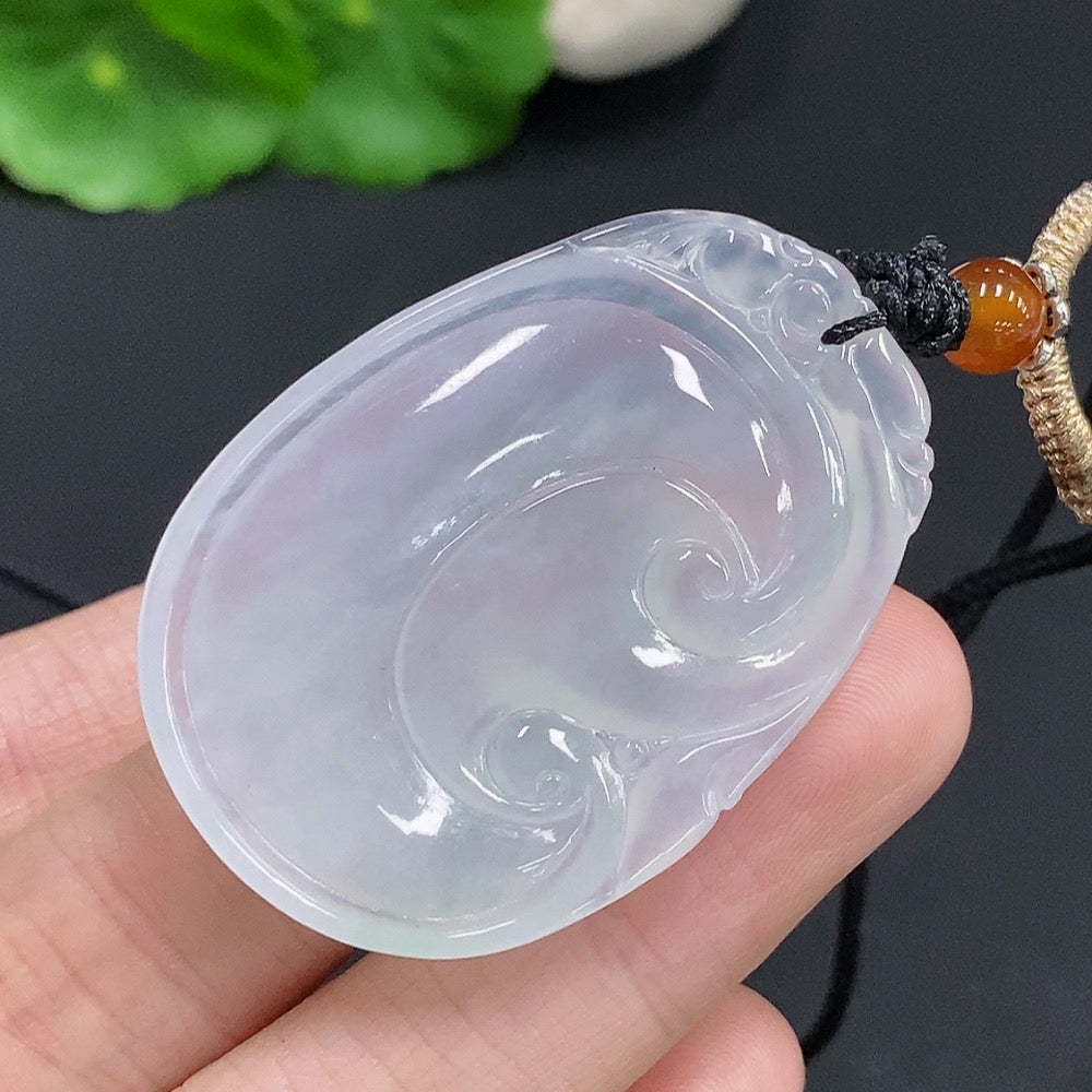 HUILIU HQ jadeite Ruyi pendant with cord, weighing approximately 15.5 grams, showcasing smooth, polished jade with intricate carvings.