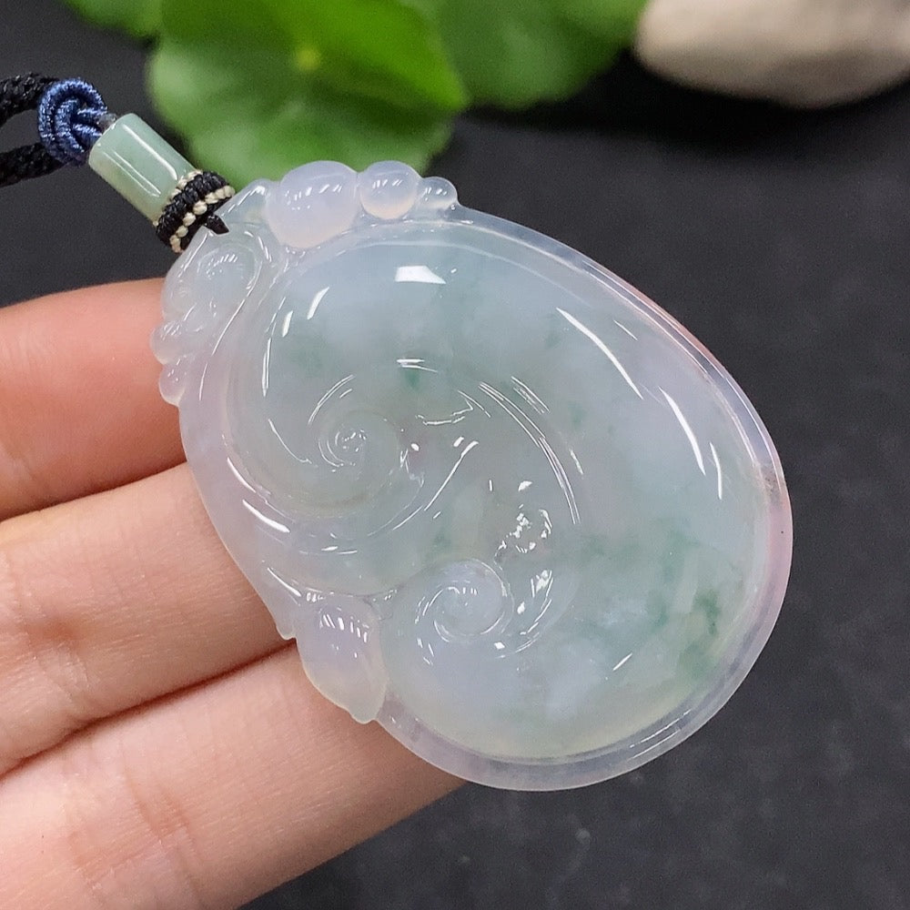 Jadeite Ruyi pendant from HUILIU HQ, crafted from green jade, weighing approximately 16.7g including cord, with intricate carved design.