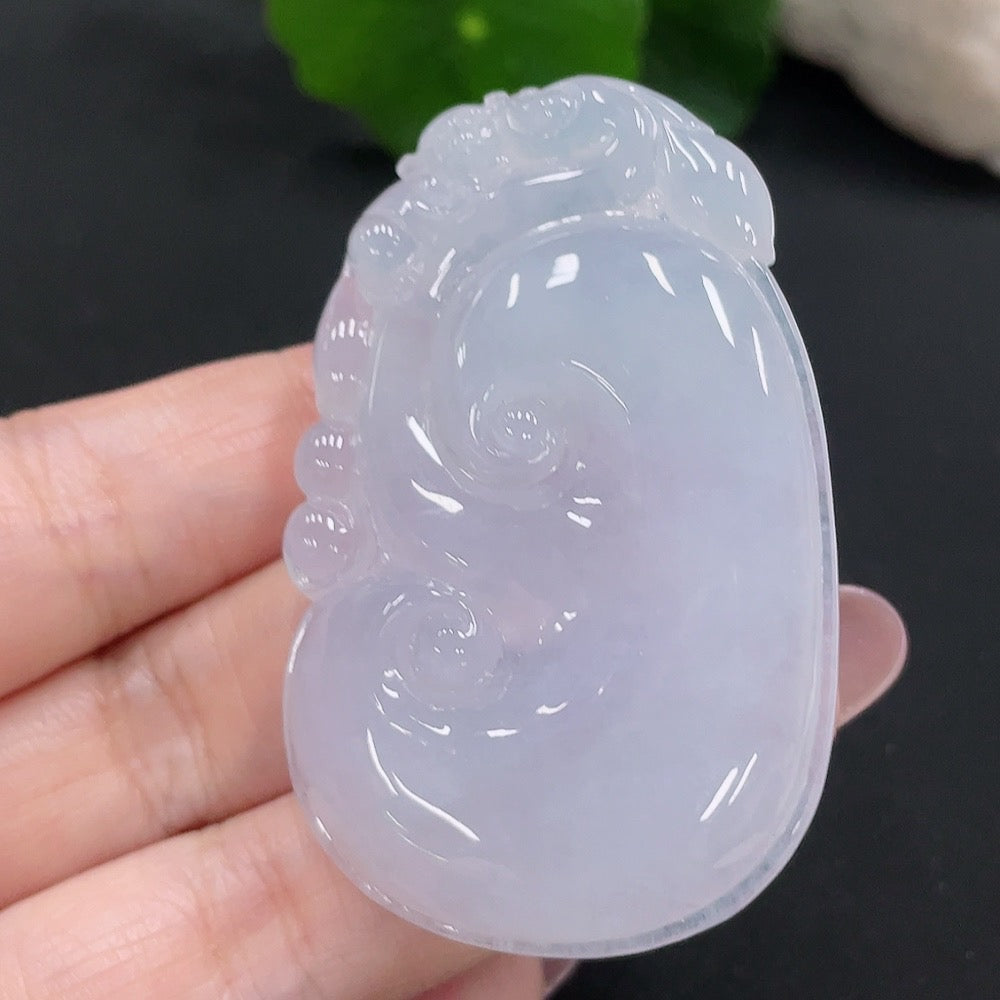 HUILIU HQ jadeite Ruyi pendant, natural green jade with intricate carving, weighs approximately 27.57g, displayed on a plain background.