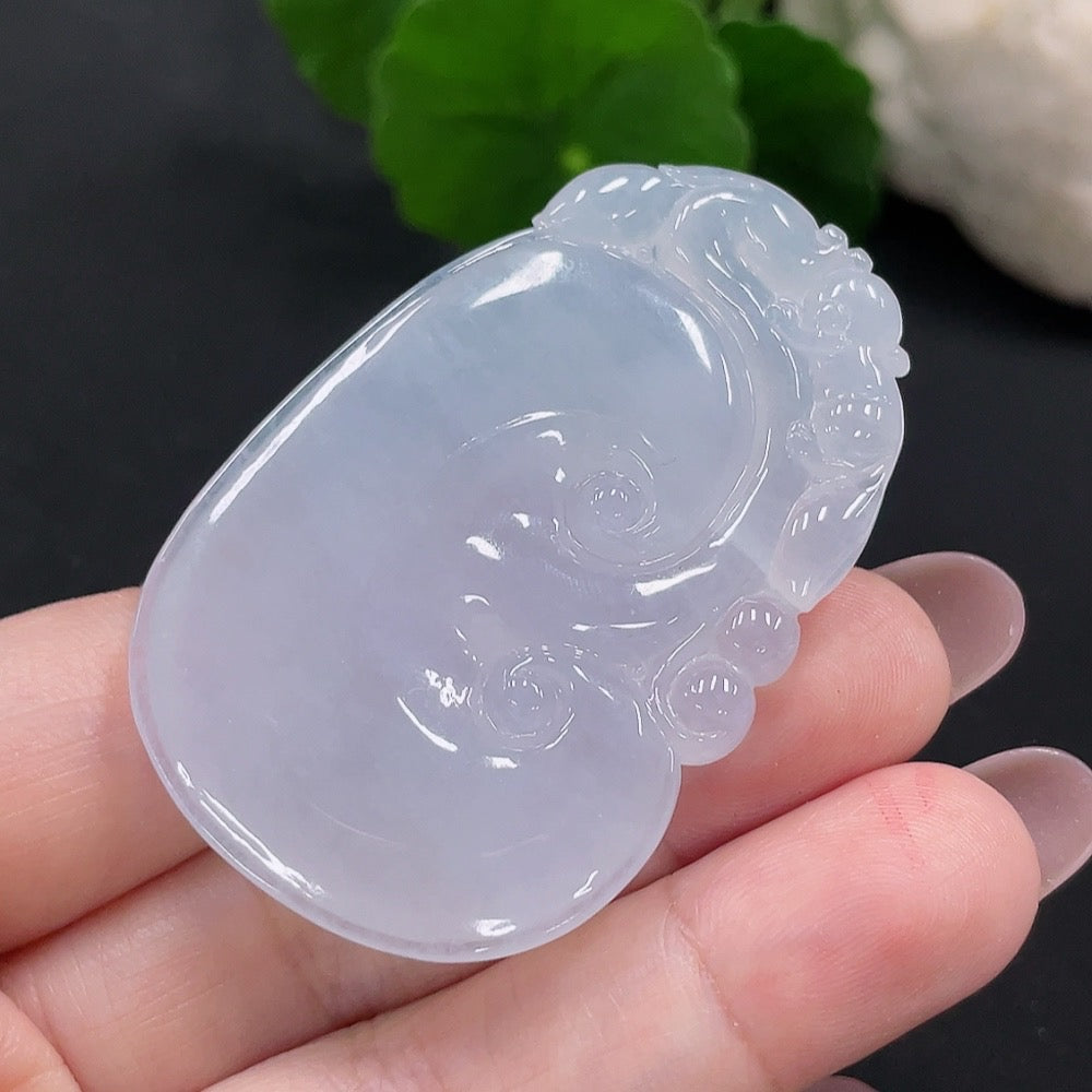 Jadeite Ruyi pendant from HUILIU HQ, crafted from green jade, weighing approximately 27.57g, with intricate carved design.