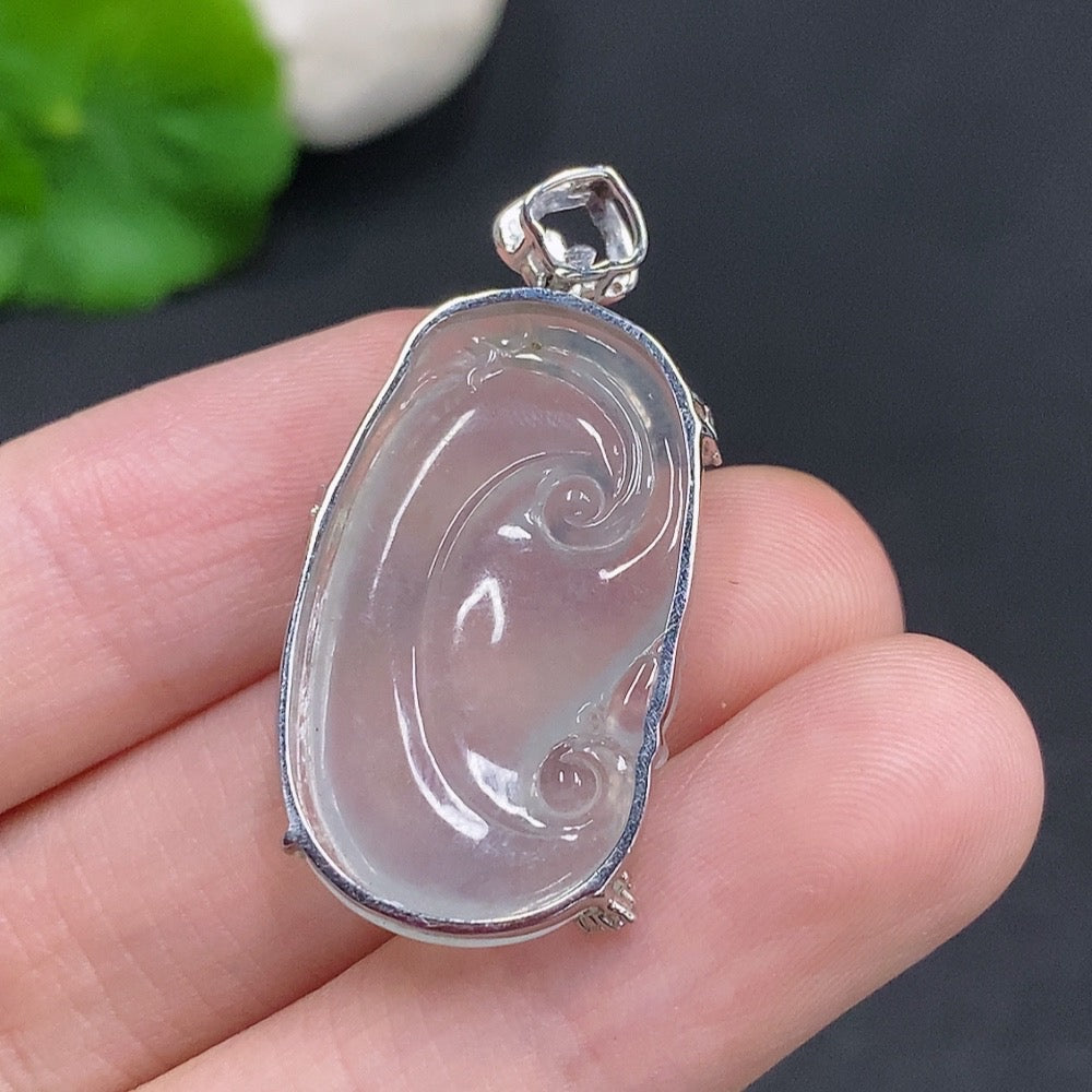 Huiliu certified jadeite Ruyi pendant with diamond accents, featuring intricate carving and elegant design.