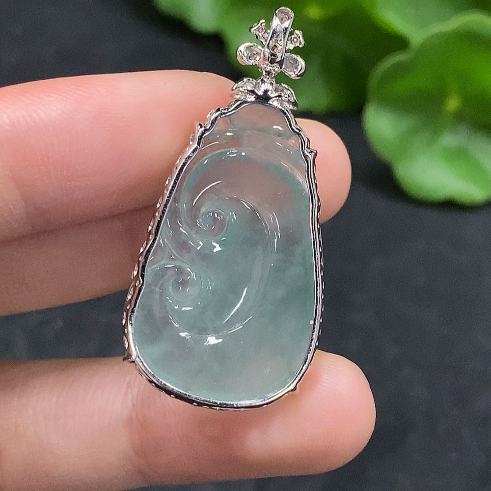 Huiliu Jadeite Ruyi pendant with diamond inlay, showcasing intricate craftsmanship and vibrant green jade, certified by Huiliu HQ.