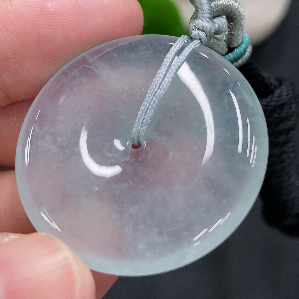 Huiliu HQ Jadeite safety buckle with rope, made of polished jade, showcasing a smooth, natural green jade finish.