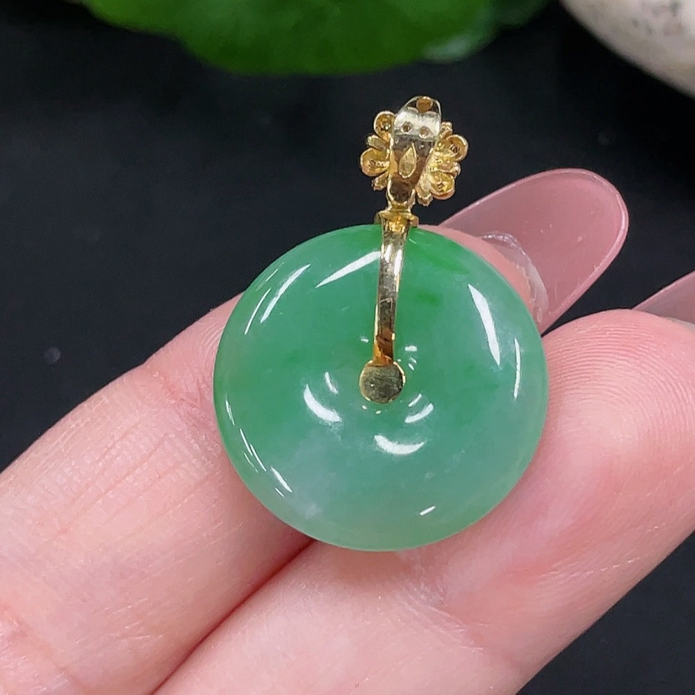 Jadeite safety pendant by HUILIU HQ with 18K gold and diamond accents, weighing approximately 3.3 grams.