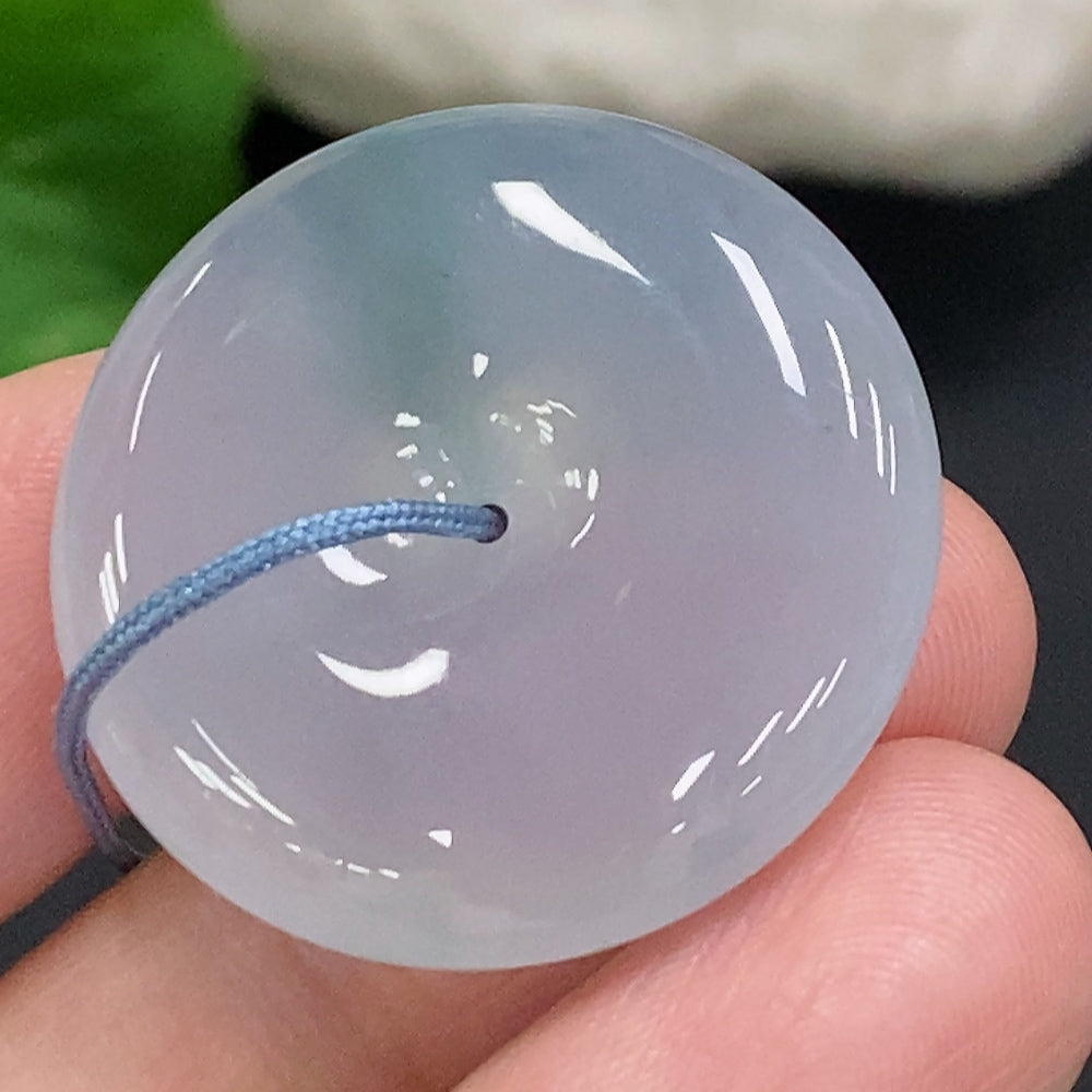 Huiliu HQ jadeite safety pendant made of green jade, featuring a polished, natural stone design with a secure safety bail and Huiliu certification