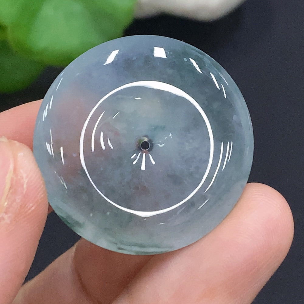 HUILIU HQ jadeite safety pendant, 10g, featuring smooth green jade with carved design on a silver chain.