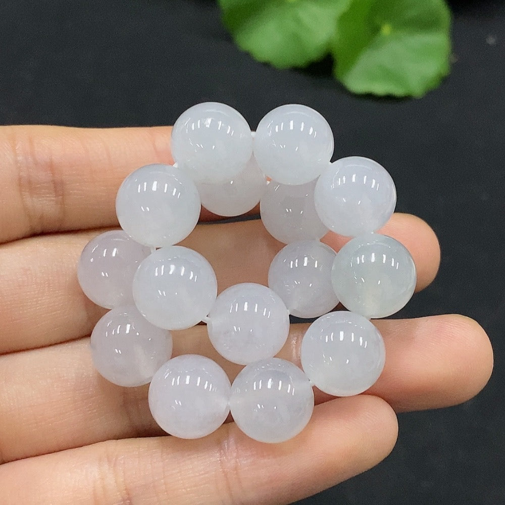 HUILIU HQ jadeite bracelet with approx. 10.9mm beads, total weight about 35.6g, featuring smooth, polished green jade stones.