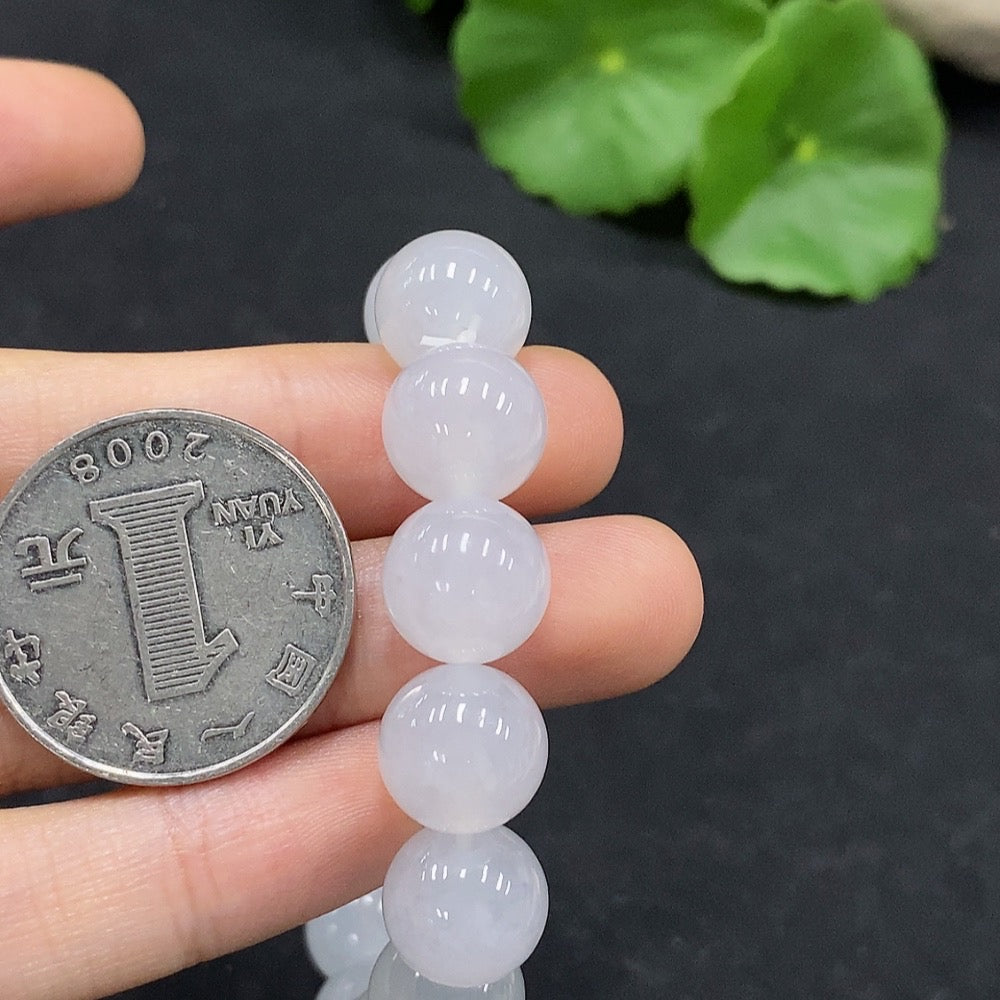 HUILIU HQ jadeite bracelet with 10.9mm beads, approximately 35.6g, showcasing smooth, polished green jade beads.