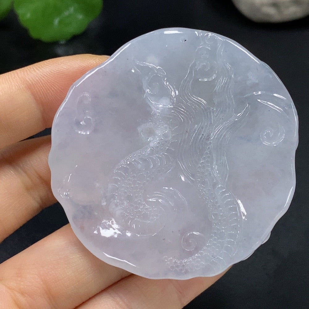 Huiliu certified jadeite dragon pendant, intricate green jade design, hanging from a cord, showcasing detailed craftsmanship.