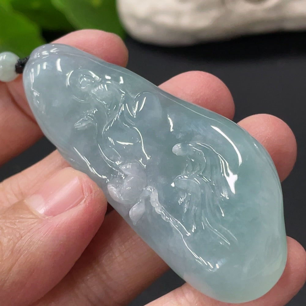 HUILIU HQ Jadeite Enlightenment Pendant showcasing a smooth, polished green jade pendant with intricate carvings.