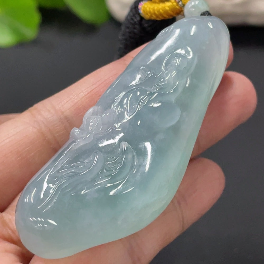 HUILIU HQ Jadeite Enlightenment Pendant featuring polished green jade with intricate carvings on a white background