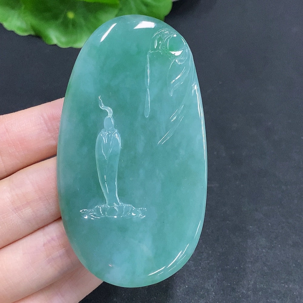 Jadeite Guanyin pendant with a formless design, crafted from green jade, featuring intricate carved details.