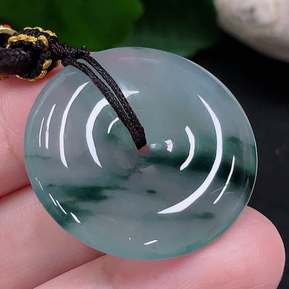 HUILIU HQ Jadeite Peace Buckle Pendant featuring a smooth, polished jadeite jade pendant with intricate carvings.