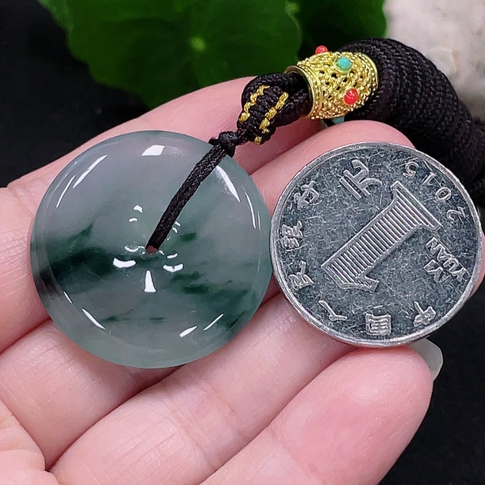 HUILIU HQ Jadeite Peace Buckle Pendant featuring a polished green jade buckle pendant on a delicate string.