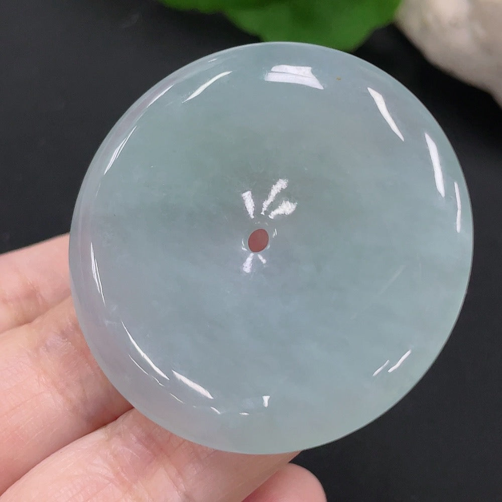HUILIU HQ Jadeite Peace button pendant made of smooth green jade, featuring a polished, rounded design.