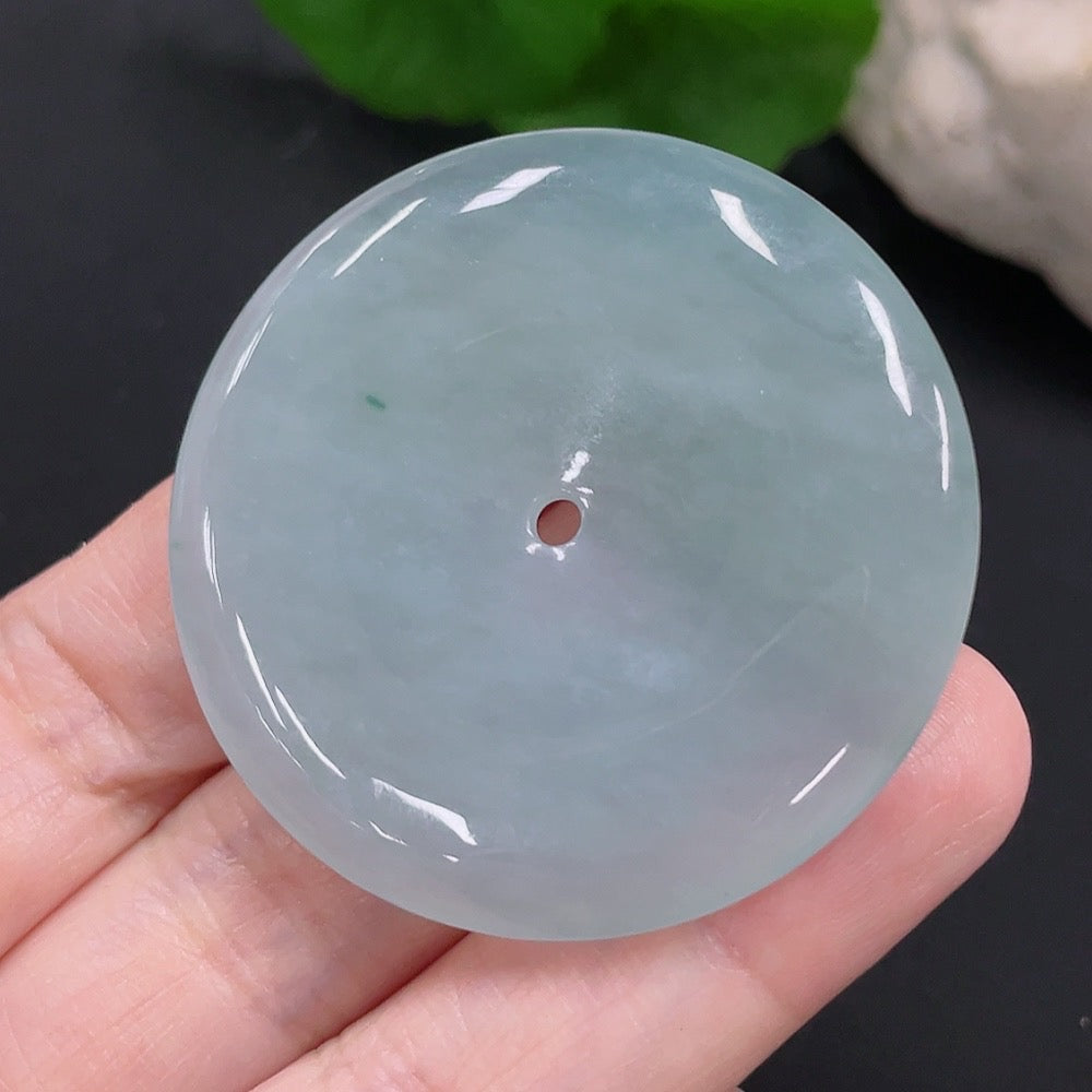 HUILIU HQ Jadeite Peace Button Pendant featuring a smooth, polished green jadeite jade pendant on a string.
