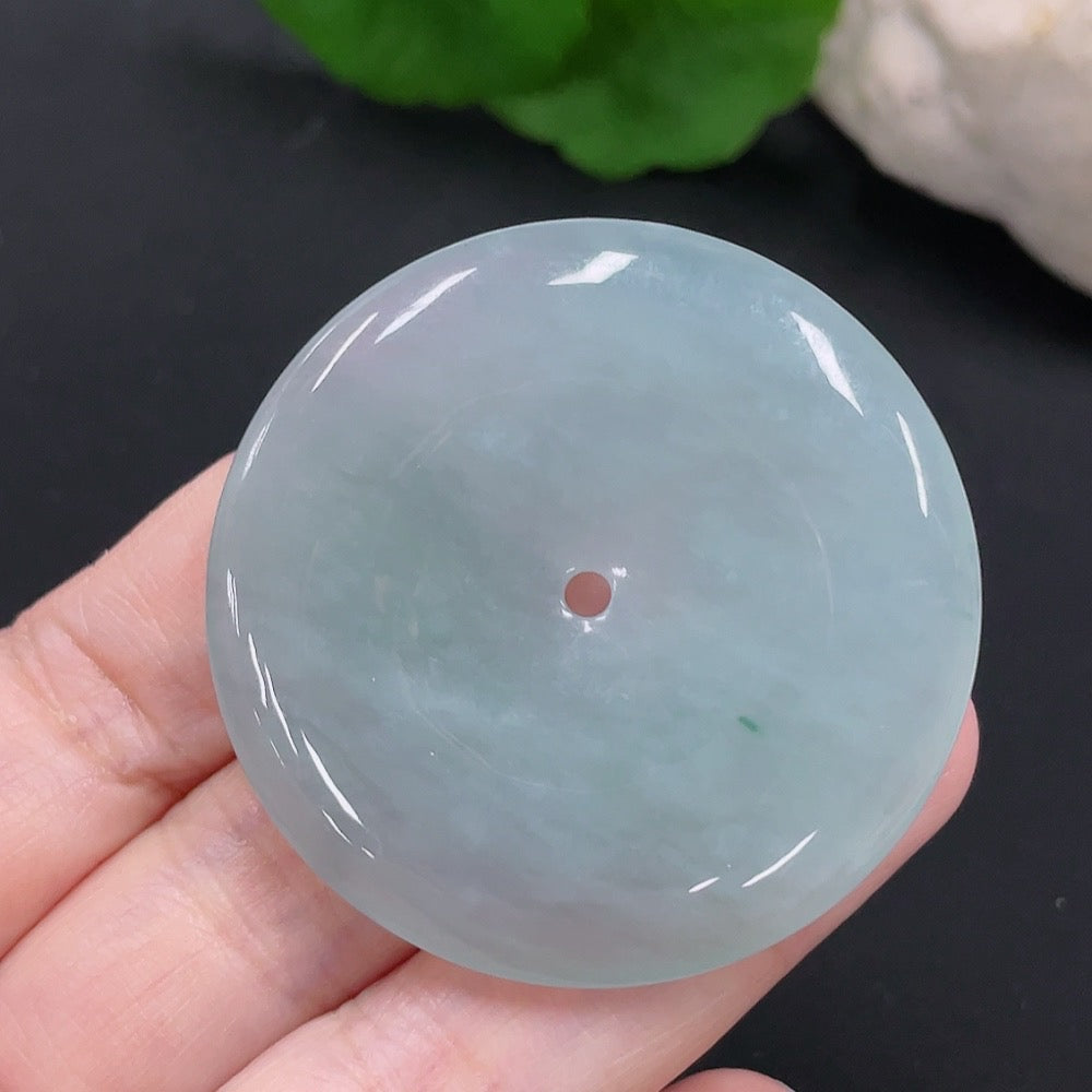 Jadeite Peace button pendant by HUILIU HQ featuring a smooth, polished jadeite jade pendant with carved design.