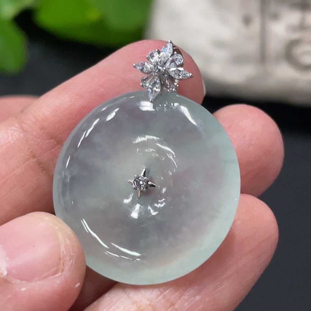 HUILIU HQ Jadeite Peace Knot Pendant featuring a smooth, polished jade pendant with intricate knot design on a cord.