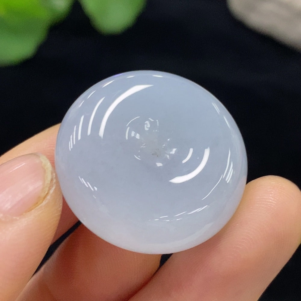 Huiliu certified JadeitePeace pendant featuring a smooth jadeite jade pendant with intricate carvings and natural green color.