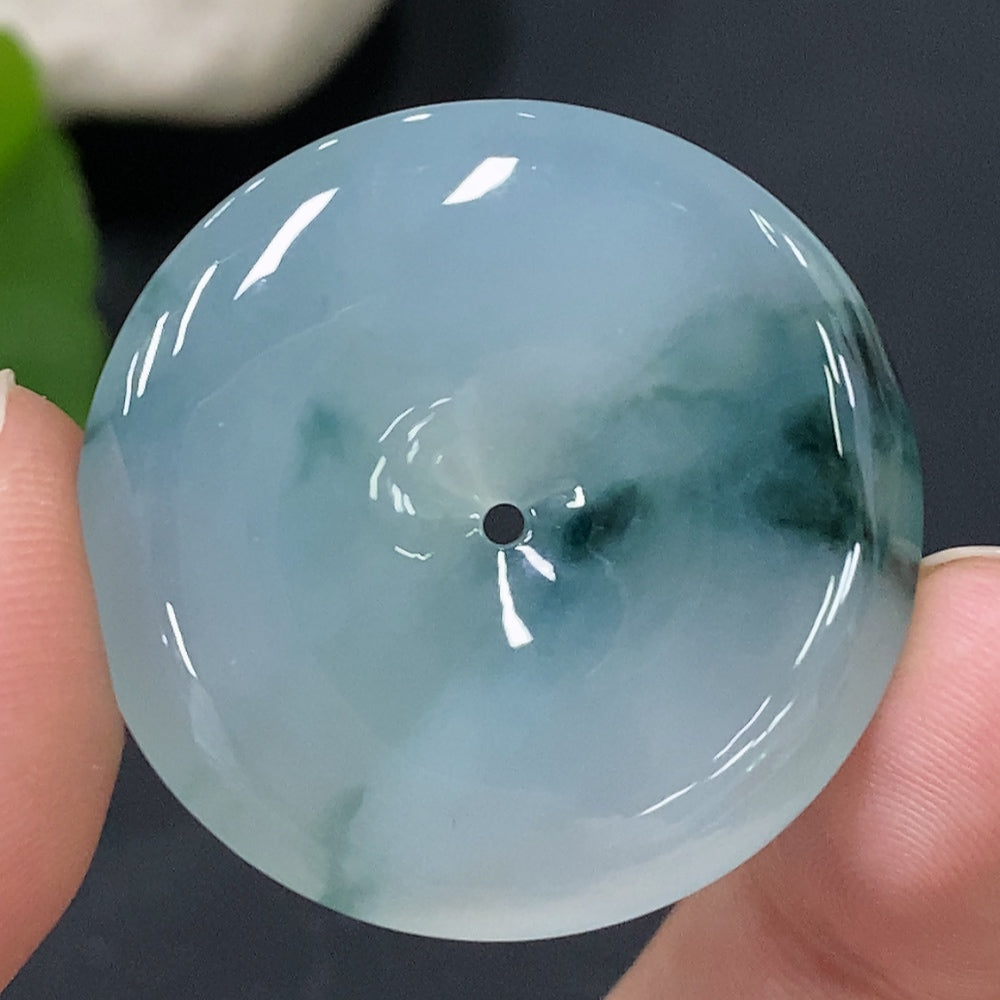 HUILIU HQ jadeite pendant featuring a peace buckle design, approximately 10.94g, showcasing smooth green jade with detailed craftsmanship.