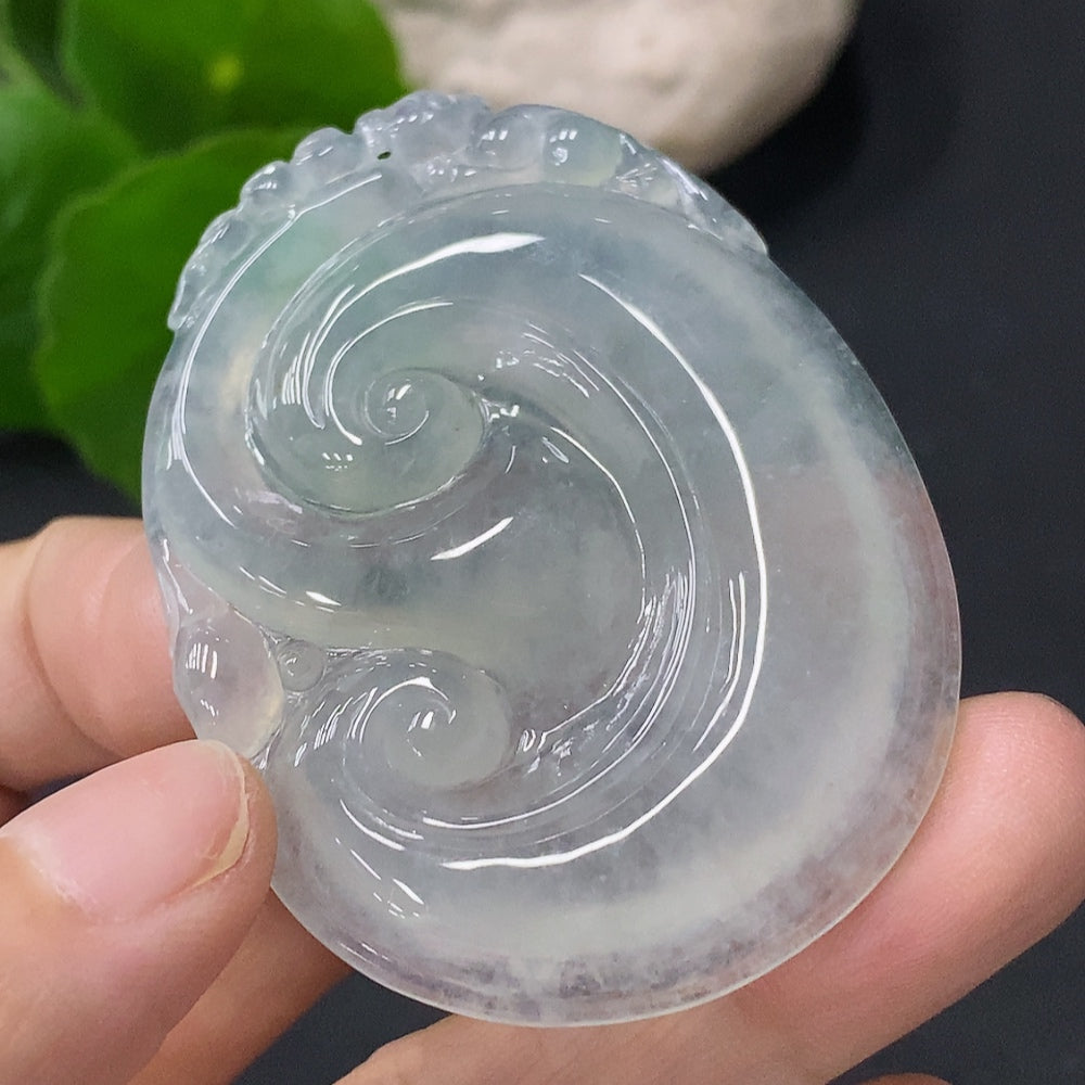 HUILIU HQ jadeite Ruyi pendant featuring intricate carved jade design, showcasing smooth, polished green jade craftsmanship.