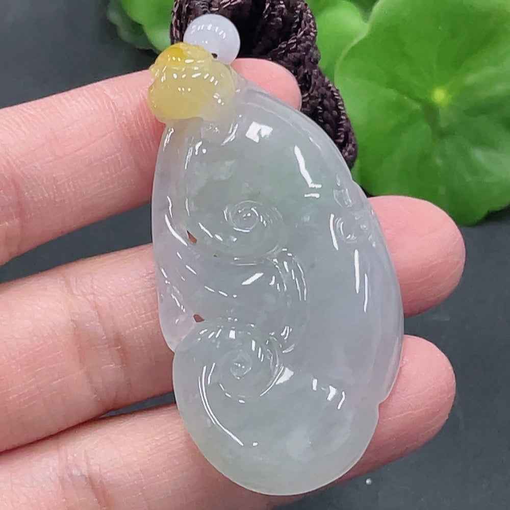 HUILIU HQ jadeite Ruyi pendant weighing approximately 23.8g, crafted from smooth green jade with intricate carved details.