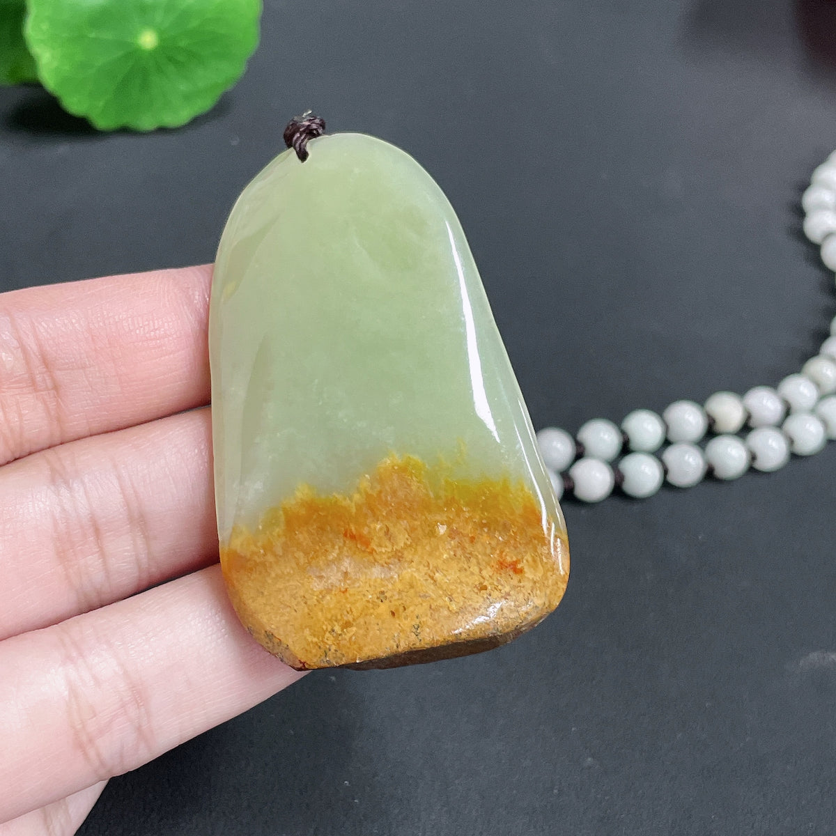 Huiliu HUILIU HQ Khotan jade Guanyin pendant with chain, natural jade color, certified, featuring intricate carving on smooth jade surface.