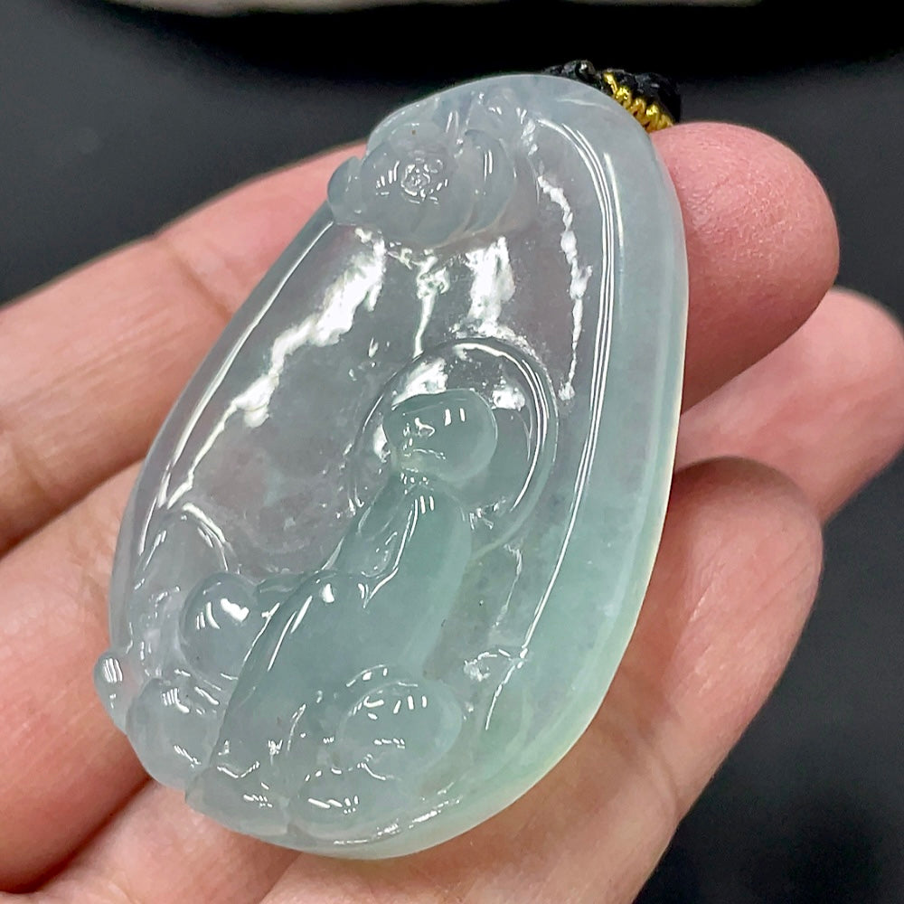 Natural Grade A Jadeite Enlightenment Pendant by HUILIU HQ, showcases polished jade with a smooth, elegant design, weighing about 23.73g.