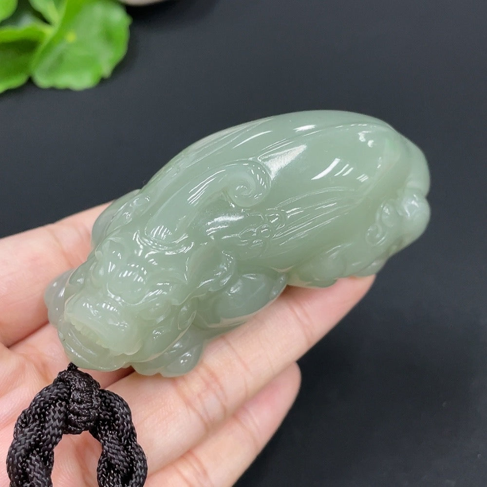 Natural Grade A jadeite Pi Xiu handheld pendant with rope, weighing approx. 128.4g, HUILIU HQ certified jade jewelry.