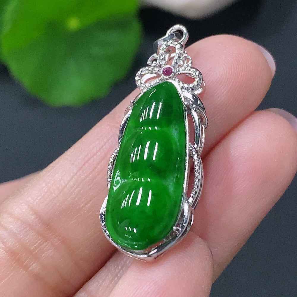 Natural Grade A jadeite lucky bean pendant with inlaid design from HUILIU HQ, showcasing green jade and intricate craftsmanship.