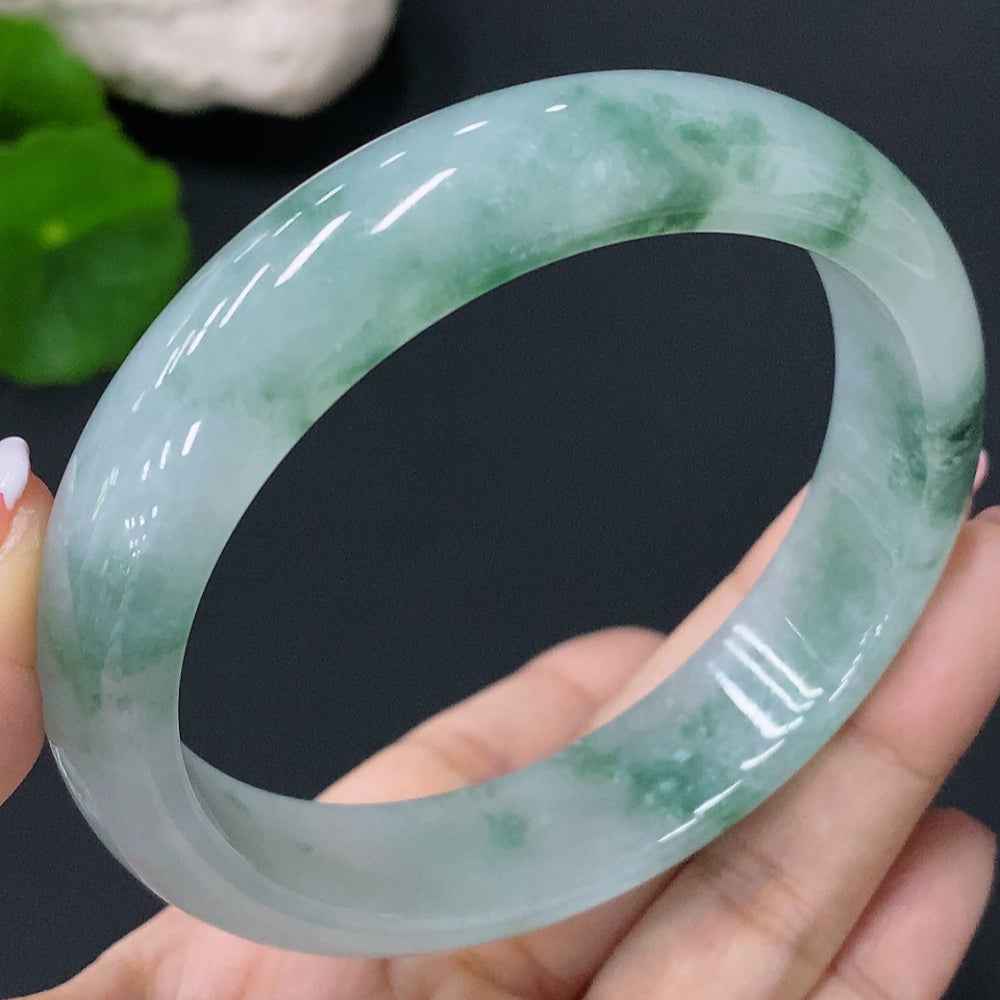 Huiliu Natural Grade A Jadeite round bracelet, 62.5mm, approximately 70.18g, certified jade jewelry with smooth polished surface.