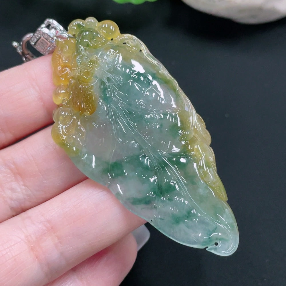 Natural Grade A jadeite pendant from HUILIU HQ, showcasing vibrant jade with intricate craftsmanship and a polished finish.