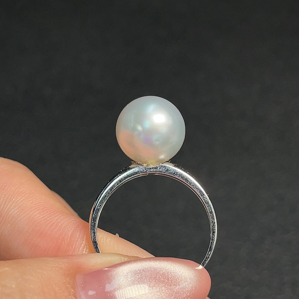 Seawater pearl ring by HUILIU HQ featuring an 11mm pearl stone, crafted with certified quality, displayed on a jewelry stand.
