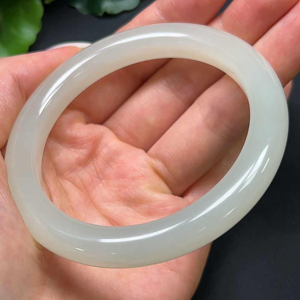 Hetian jade round bracelet from HKHQ with 58.7mm diameter and 46.12g weight, featuring smooth, polished jade beads.