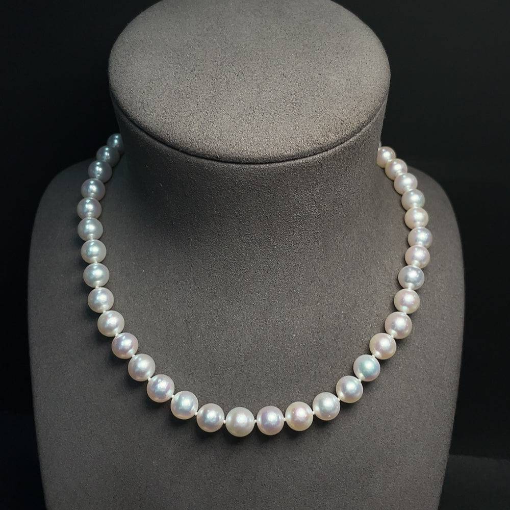 HUILIU HQ seawater pearl necklace with 49.76g weight and 9.7mm pearls, showcasing elegant white pearls on a delicate strand.