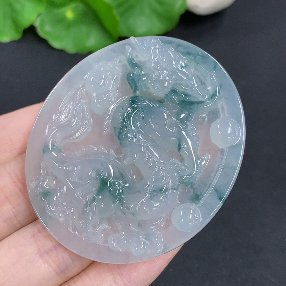 Jadeite dragon pendant necklace from HKHQ, crafted in green jadeite with intricate dragon design, weighs 29.8 grams.