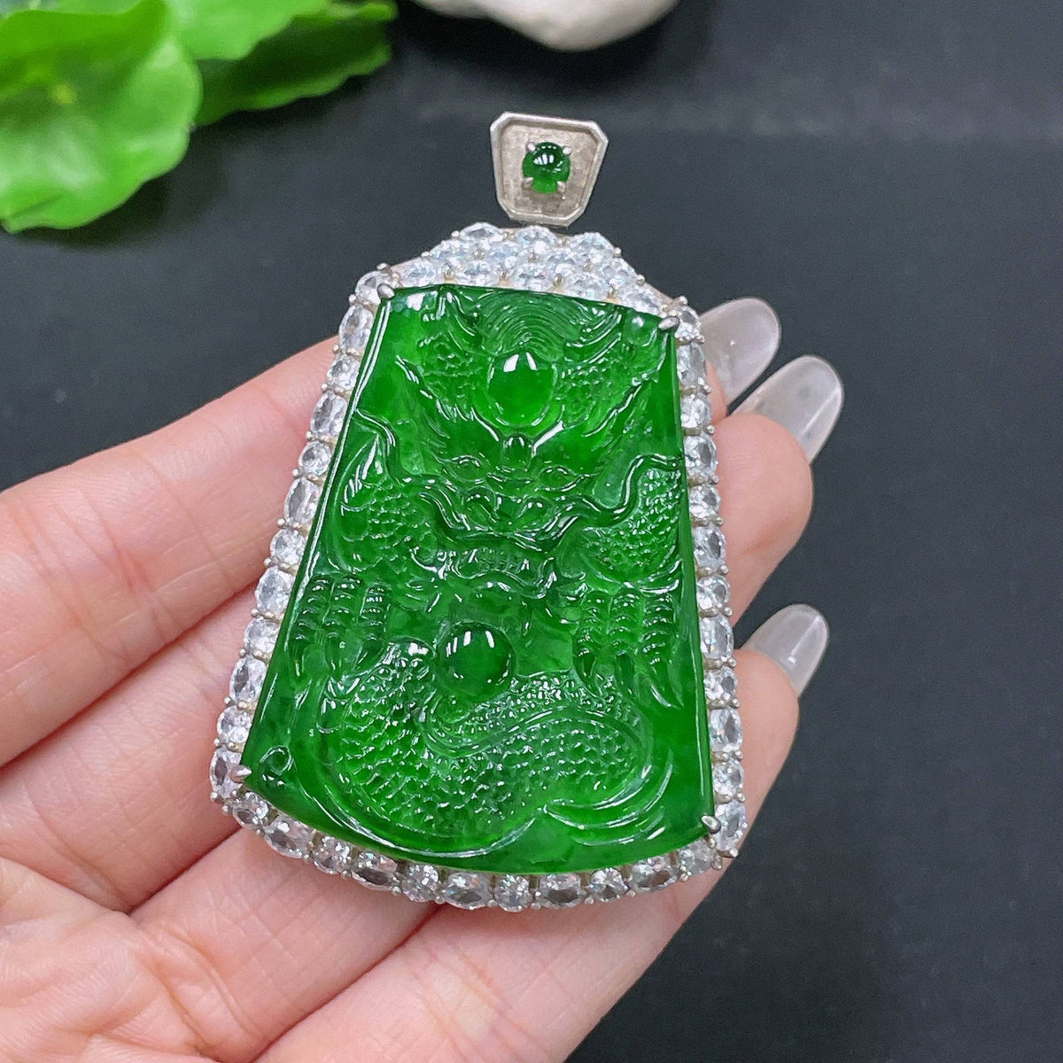 Jadeite pendant featuring a dragon plaque from HUILIU HQ, non-gold, weighing approximately 26.55g, smooth green jade surface.