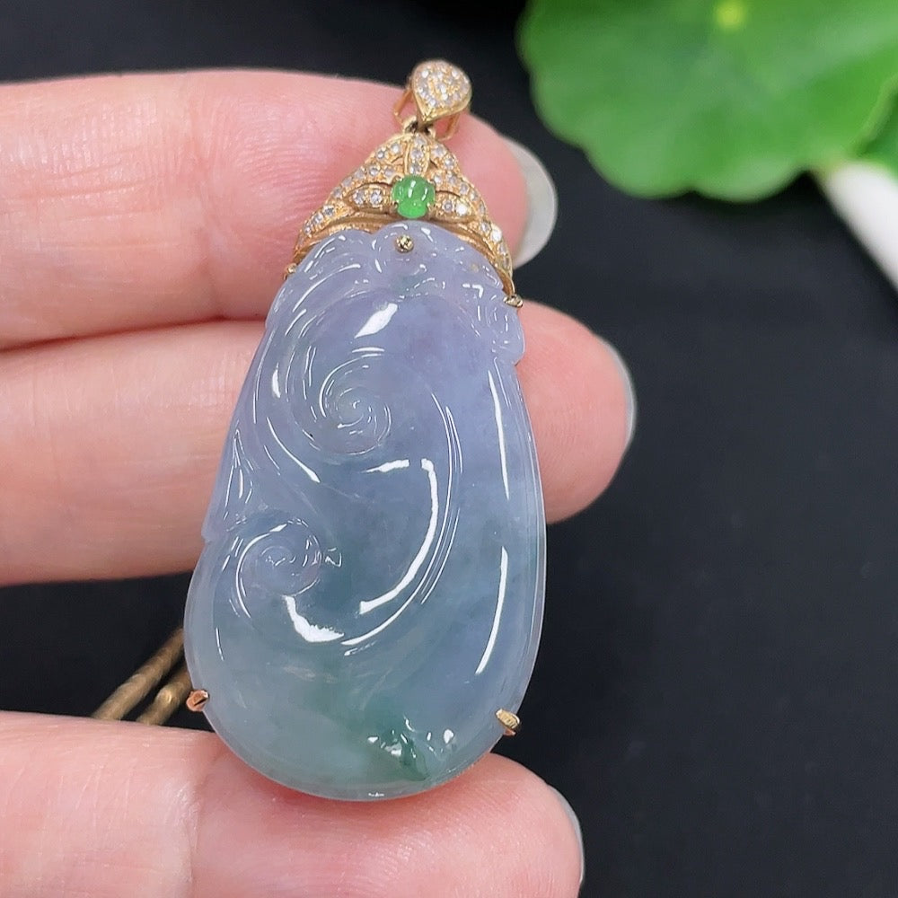 Jadeite Ruyi pendant with diamond accents in 18K gold, featuring intricate inlay design and hanging on a matching chain.